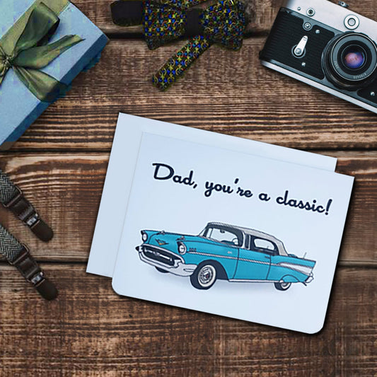Fathers day card. It has a blue classic car on it. Text reads, Dad, you're a classic!