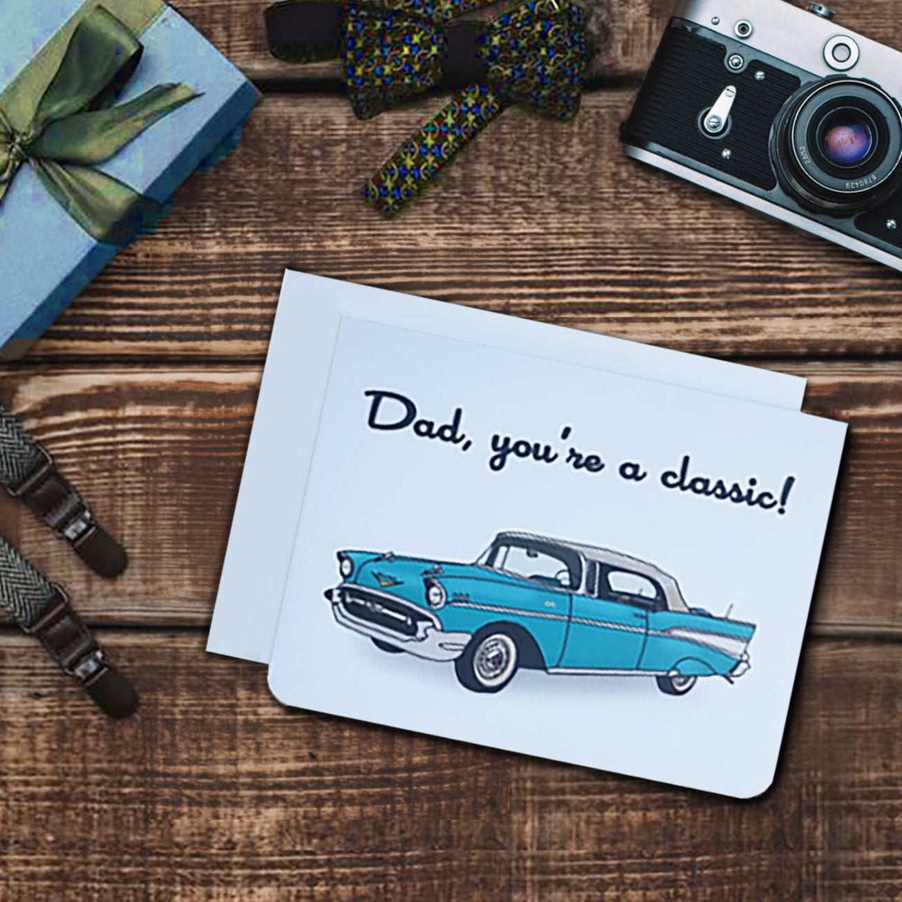 Fathers day card. It has a blue classic car on it. Text reads, Dad, you're a classic!