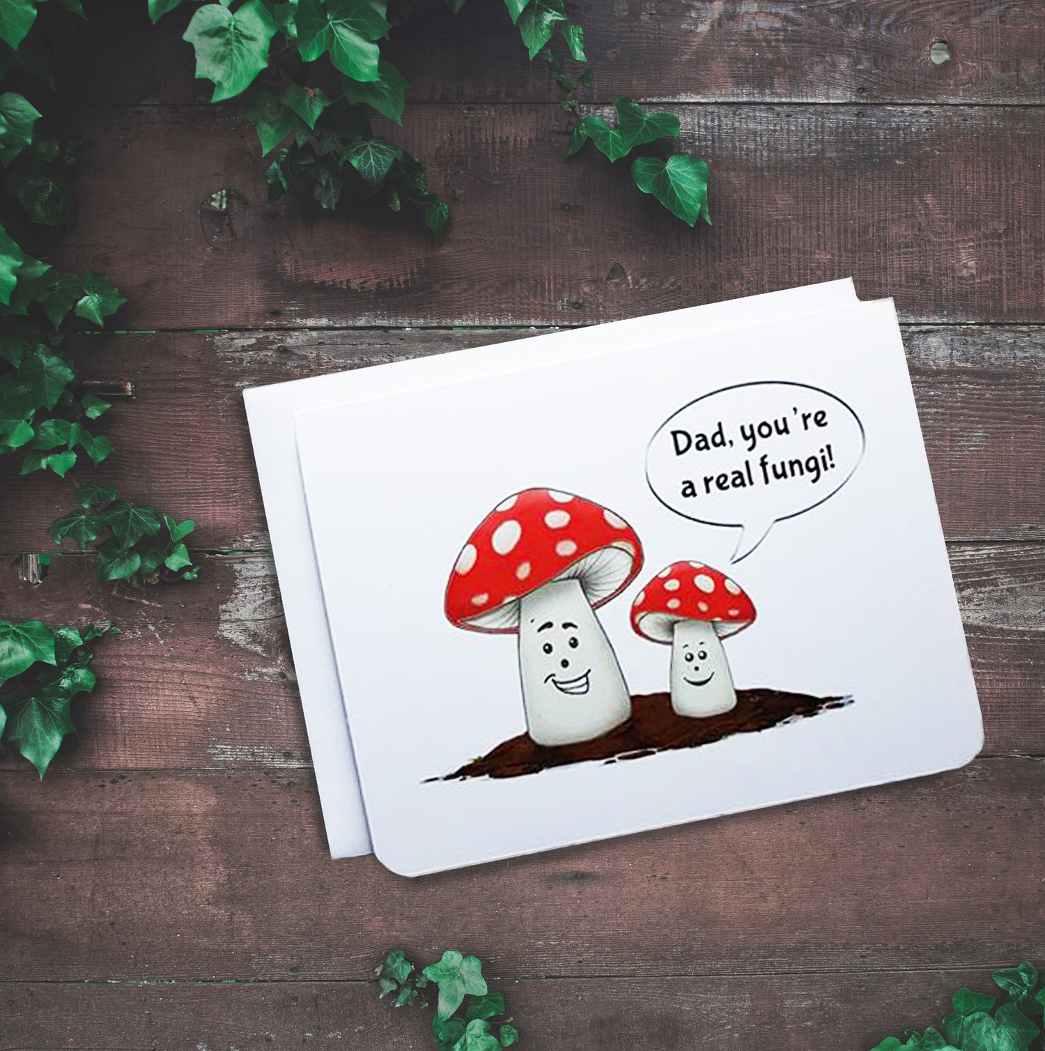 Fathers Day card. It has a small toadstool smiling at a large toadstool. The small one is saying, 'dad, you're a real fungi!'